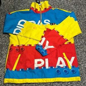 NWT. Kids Adidas and Lego colorful 1/4 zip jacket. Size XL.